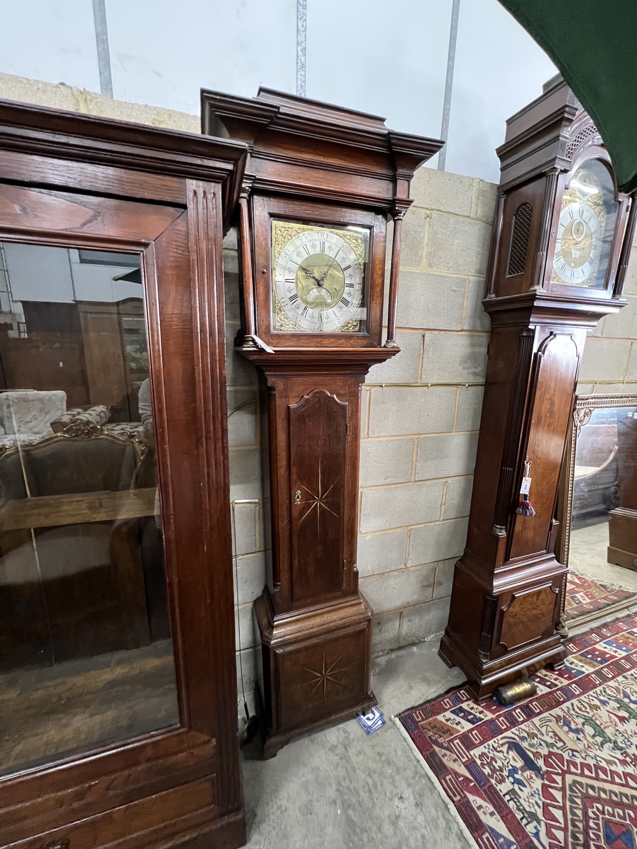 A George III inlaid oak thirty hour longcase clock, marked James Todd, Bradford, height 220cm